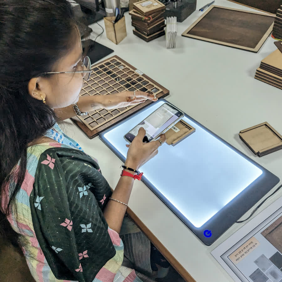 Sorting lab grown diamonds at the light table