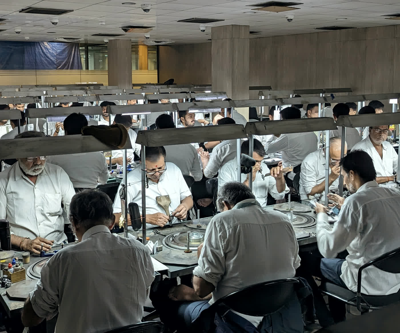 KIRA cutting and polishing floor in Surat, hundreds of diamond artisans at work